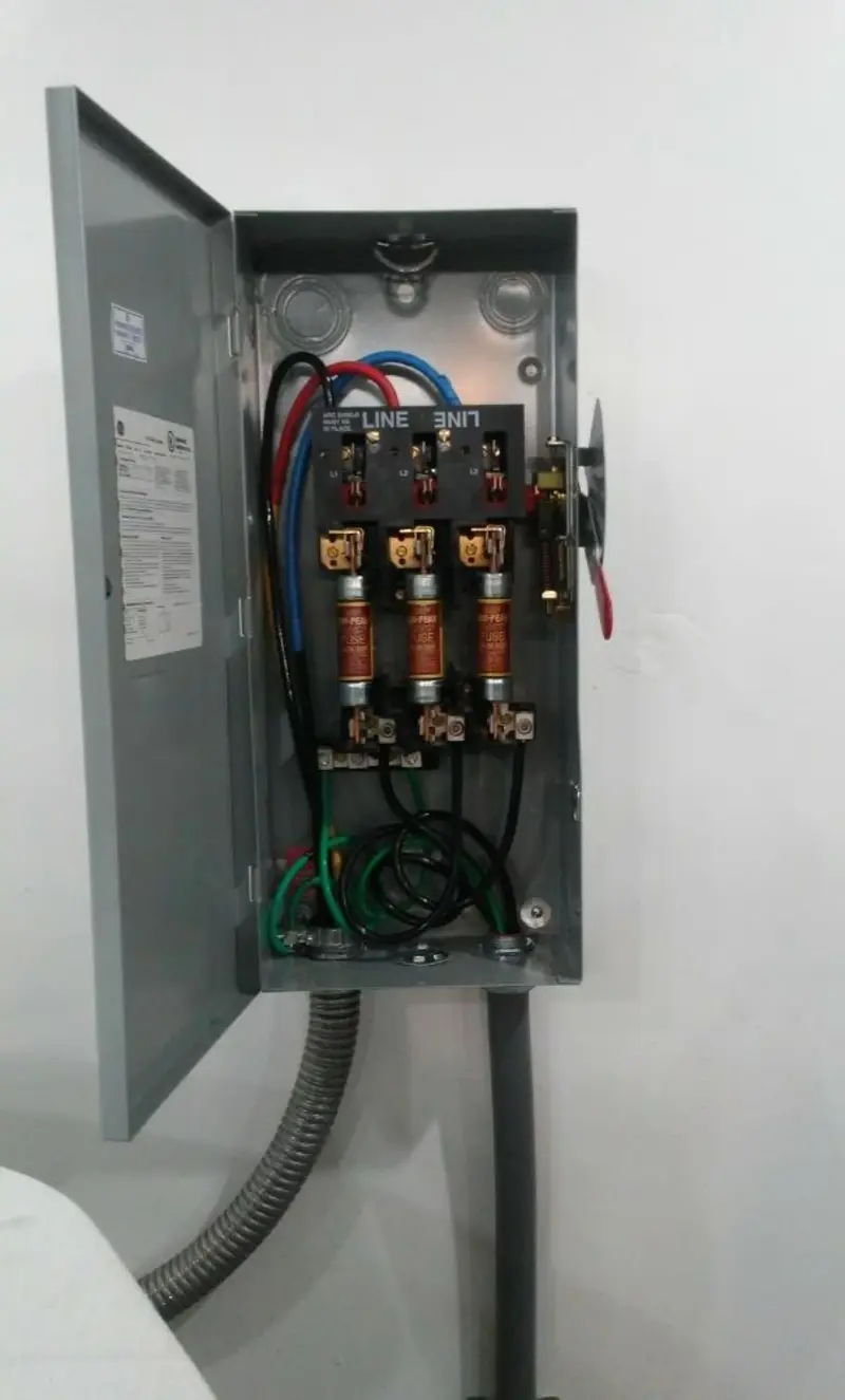 Three-phase disconnect switch installed for Smoke Detector Installation in Tuskegee